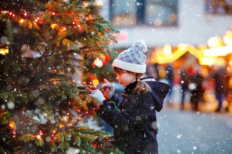 Young girl at a Christmas tree lighting