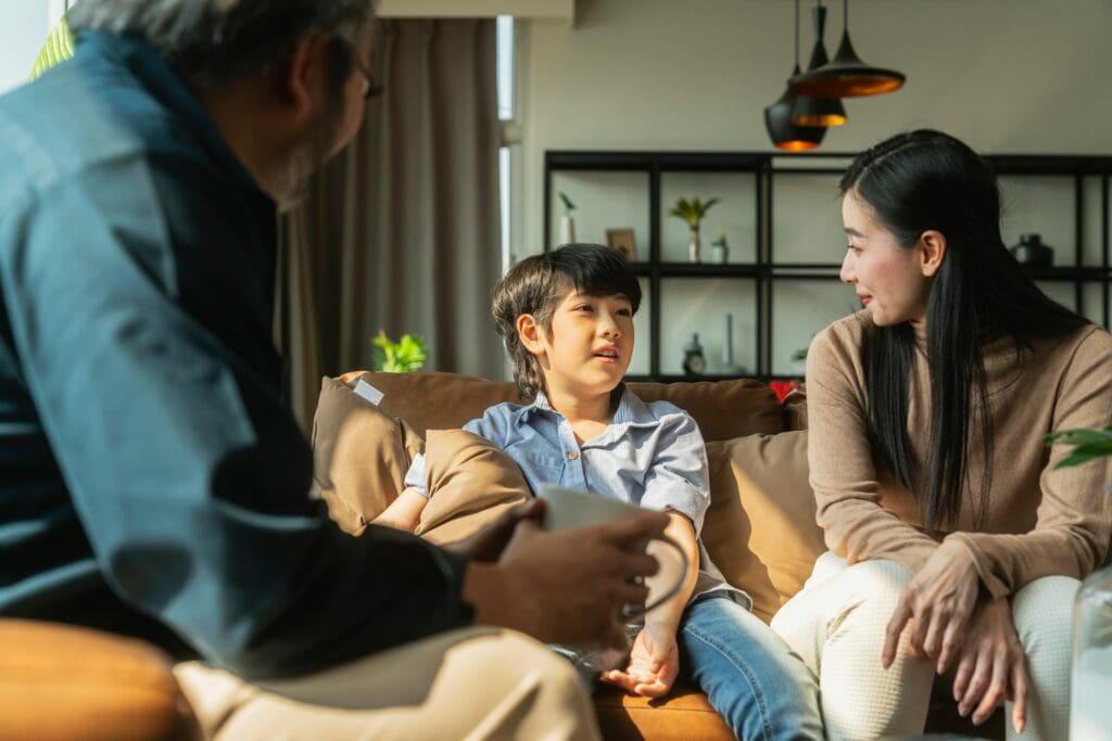 Parents discussing consent with son